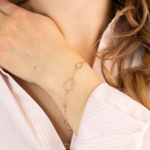 Bransoletka złote serduszka z cyrkonią (B3254 Y 375)